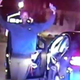 Dashcam footage shows Lawrence Crosby exiting his car holding what police would later learn is a cellphone. (CBS screenshot)